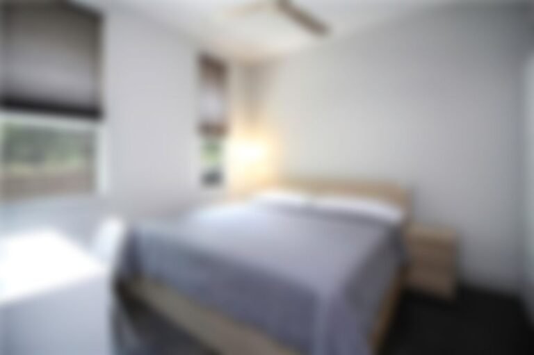 Ample bedroom fits a king-size bed.