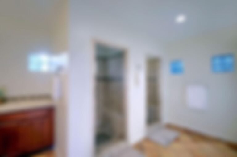 Guest house bathroom is complete with 2 showers.